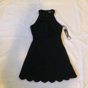 Cute unworn, black halter skater dress.